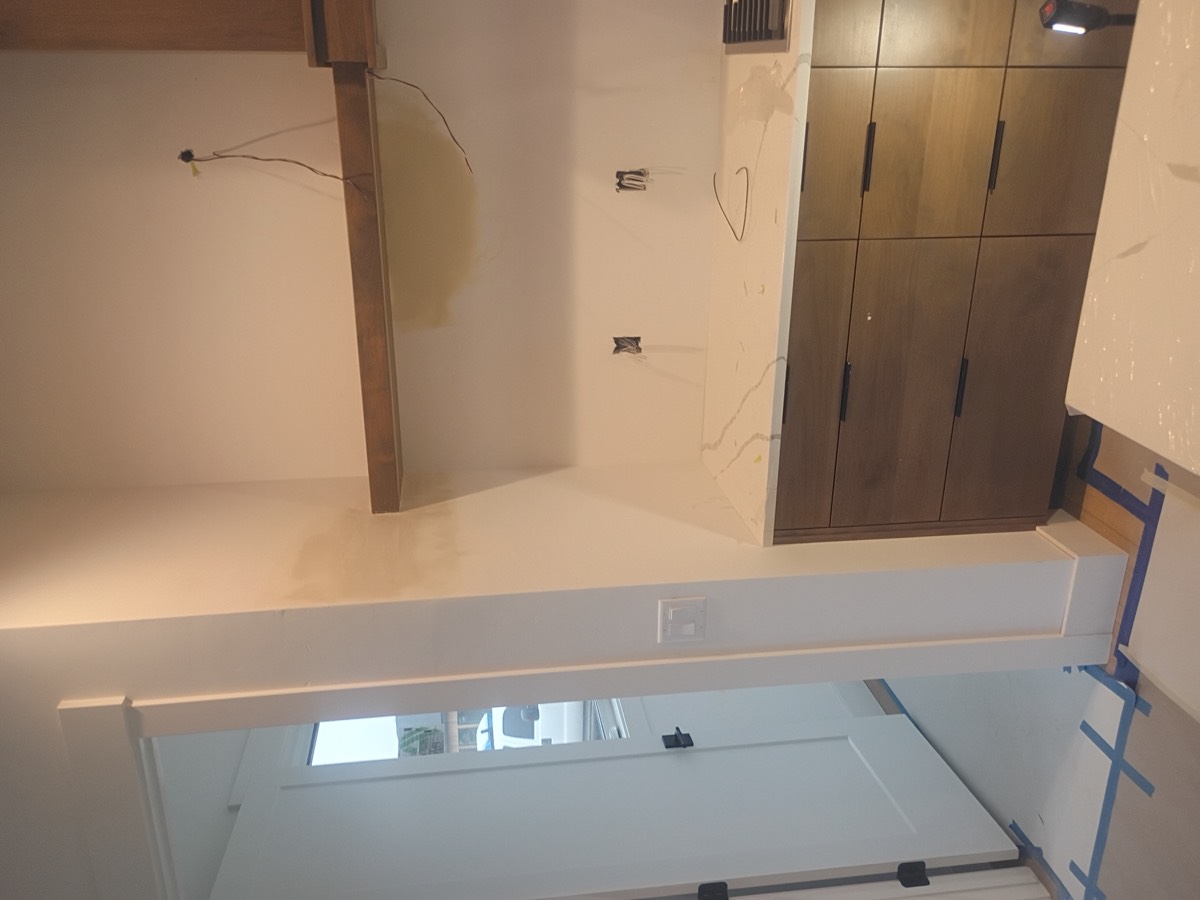 Finished ceiling and wall after drywall repair