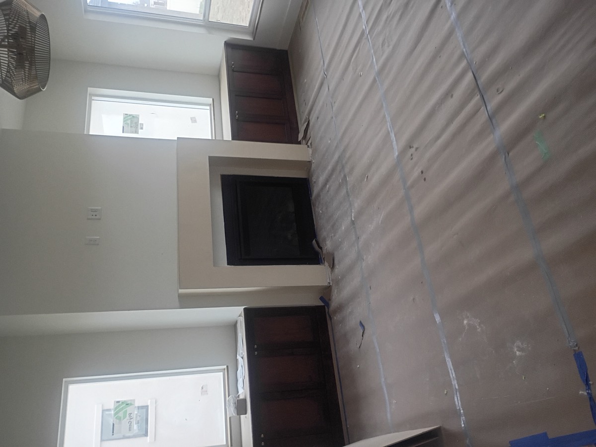 Finished ceiling and wall after drywall repair