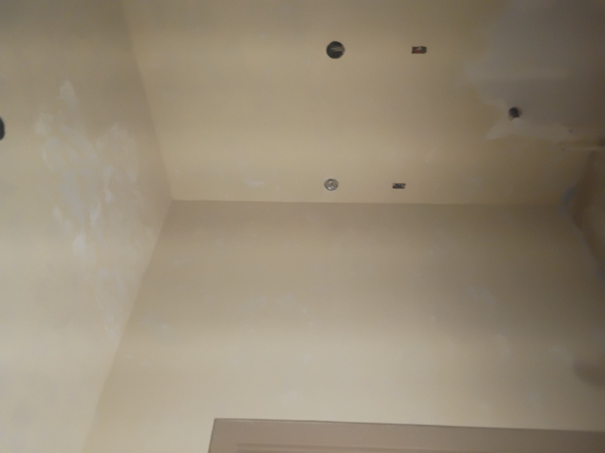 Finished ceiling and wall after drywall repair