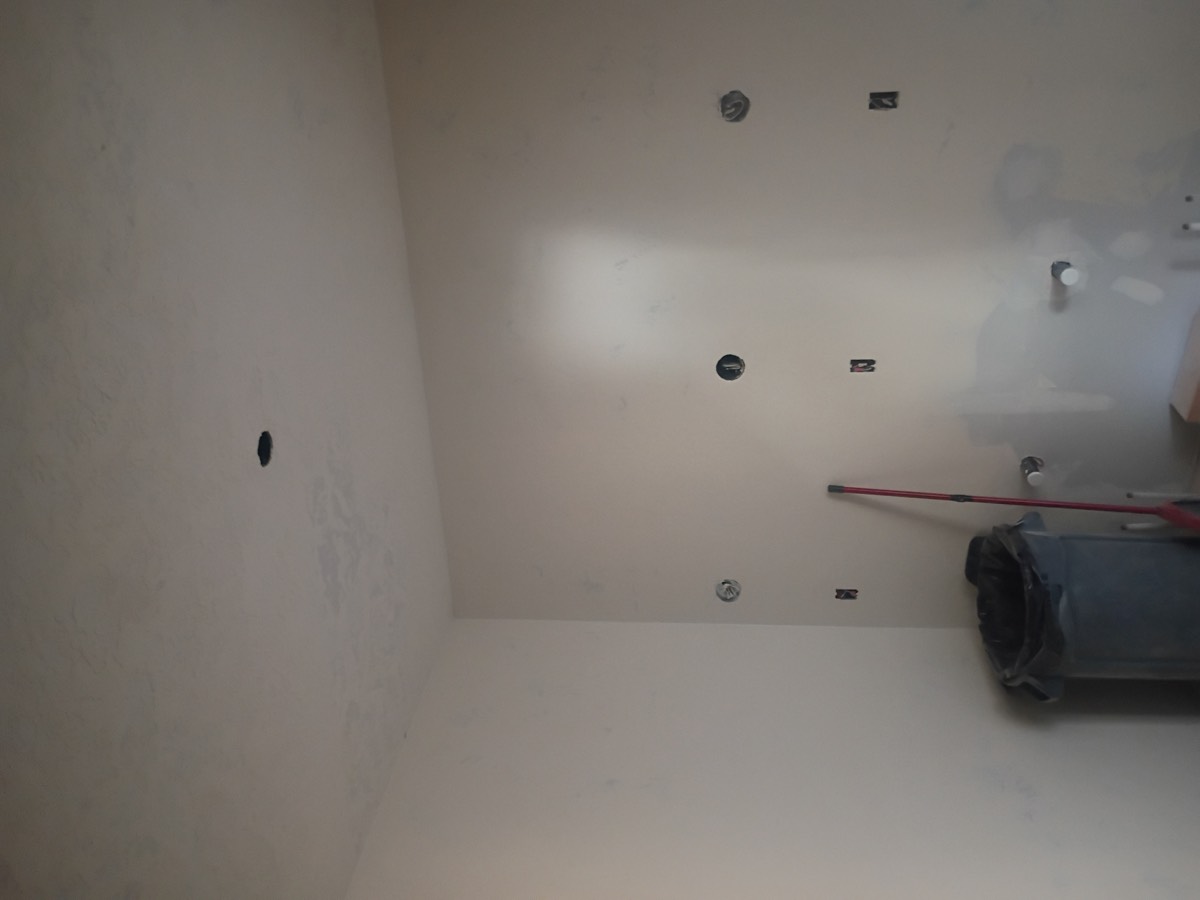 Finished ceiling and wall after drywall repair