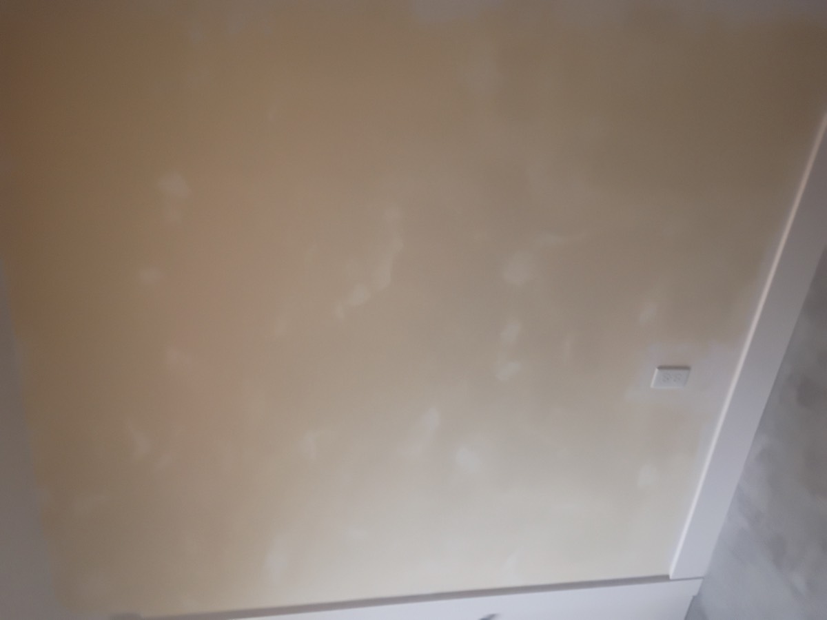 Finished ceiling and wall after drywall repair