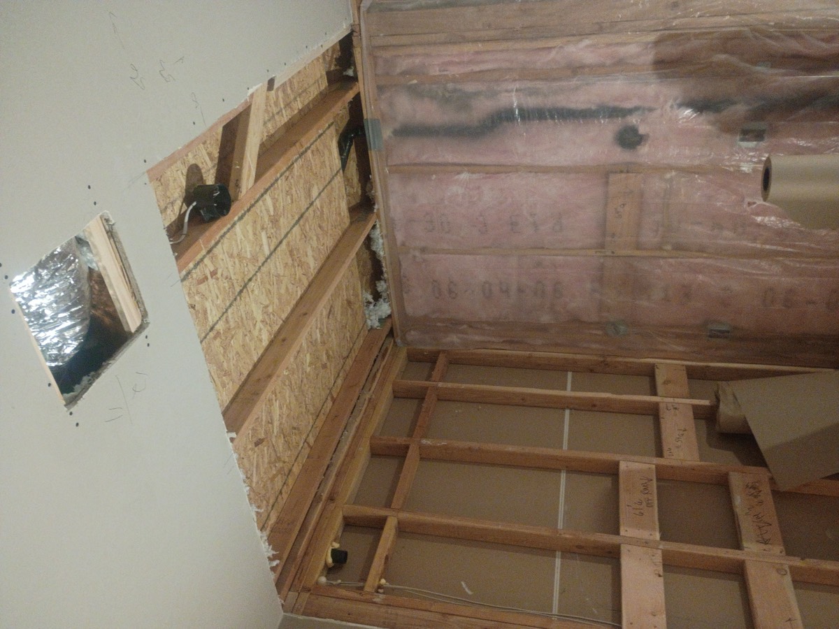Ceiling and wall before drywall repair