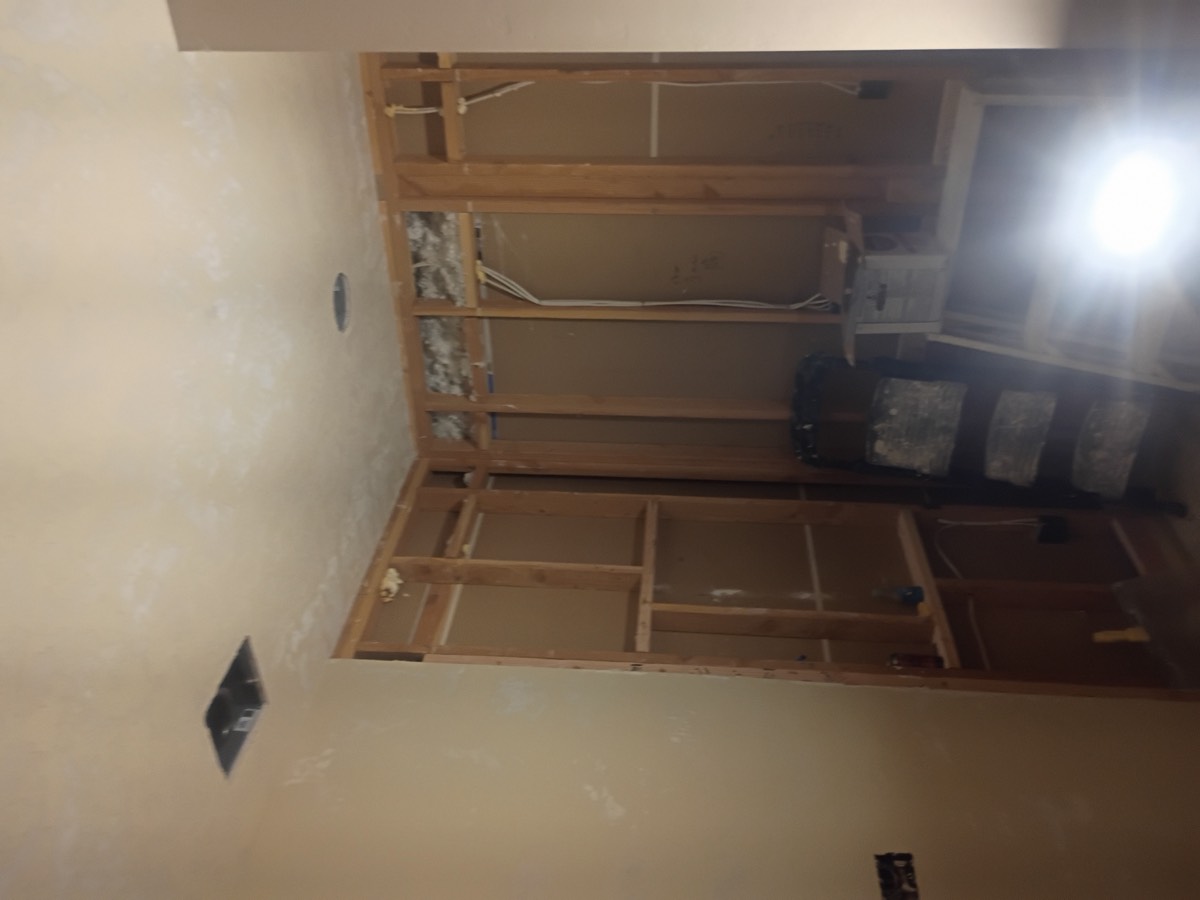 Ceiling and wall before drywall repair